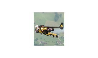 Breitling's jetman races a DC-3