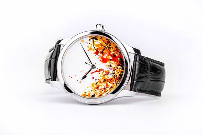 The dial by Tolli is painted by hand depicting Fire and Volcanic Eruption 