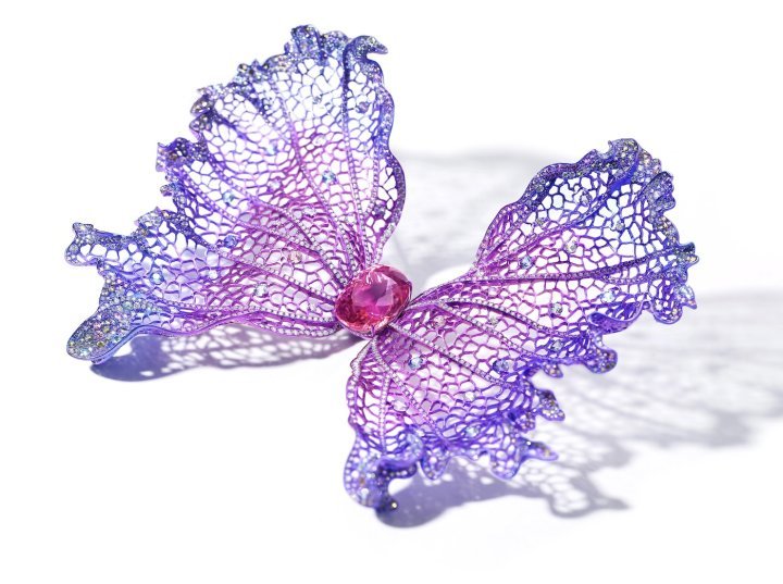 Wallis Hong “Ethereal Butterfly” brooch's intricate mesh wings that were achieved by incorporating techniques used in the esteemed, millennia-old Chinese craft of hollow out jade carving, but utilizing ultramodern titanium, for exceptional lightness.