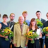 Company founder Walter Lange shares the excitement as seven graduates of the Lange Watchmaking School receive their diplomas.