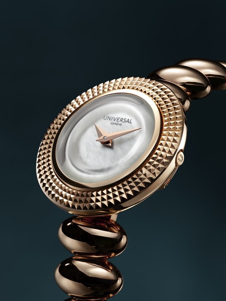 Universal Genève's new Disco Mini collection balances elegance, practicality, and personal expression with its refined mother-of-pearl dial, lugless case, superb Clou de Paris engraved large bezel and interchangeable bangle bracelet.