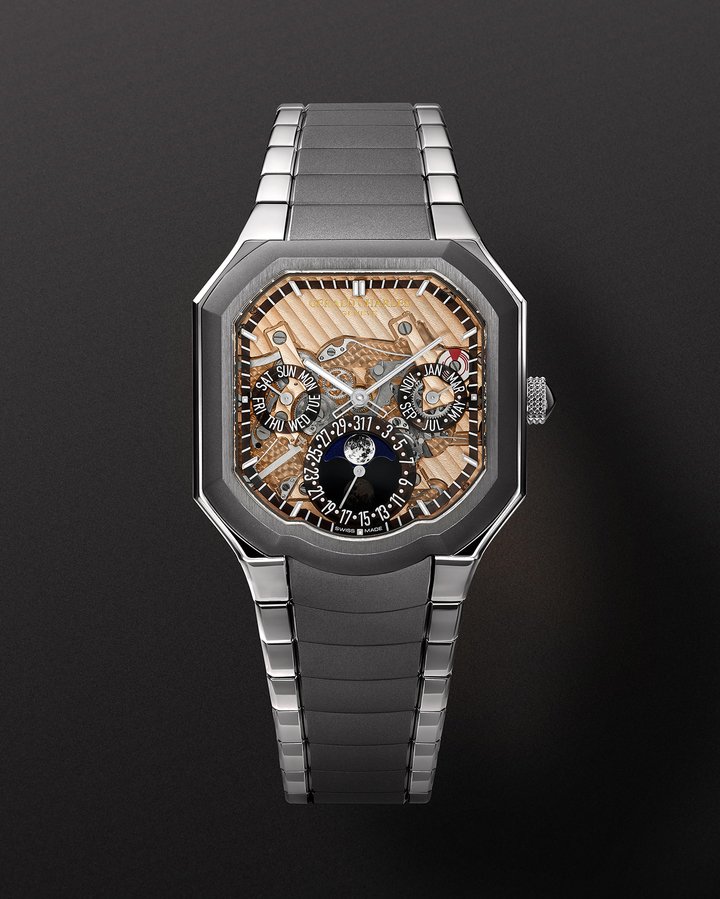 The 40mm case and three-link bracelet are both in Grade 5 titanium, and the watch is 10mm thick and weighs just 97 grams. At launch, there will be two versions. The first has a two-level fumé dial with a striking, vertical cut-out “grille” construction, finished in smoked ruthenium that graduates into darker tones towards the dial edge. The second has an open-worked dial that sits under a thin layer of sapphire crystal that holds the watch's hour markers in place. 