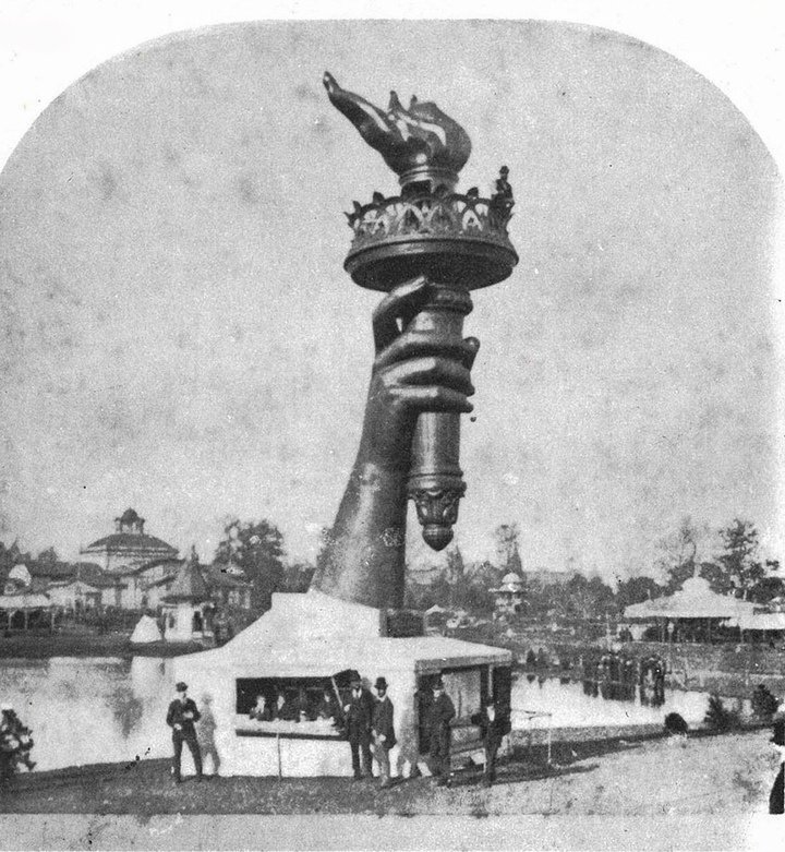 Hand holding the torch of the future Statue of Liberty, Philadelphia Fair, 1876. Stereoview (detail). Tissot Archive.