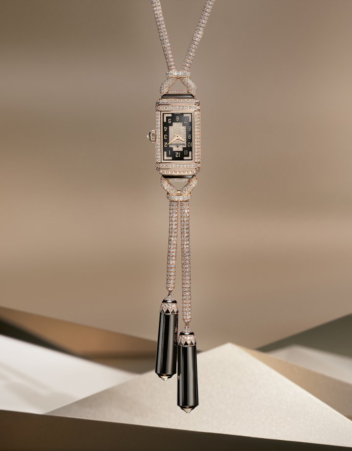 Jaeger-LeCoultre – Reverso Secret Necklace: Suspended from this fine jewellery sautoir, its supple chain composed of diamond-set links and polished onyx beads, are two polished onyx pendants and a fully gem-set secret Reverso. More than 3,000 diamonds have been carefully set in the Reverso Secret Necklace, the work of artisans at the brand's own Atelier des Métiers Rares®. This perfect union of fine jewellery, rare handcrafts and mechanical watchmaking represents over 300 hours of highly skilled and painstaking work. The movement beating inside this Reverso is the specially designed manual-winding Calibre 846. Limited production. $$$