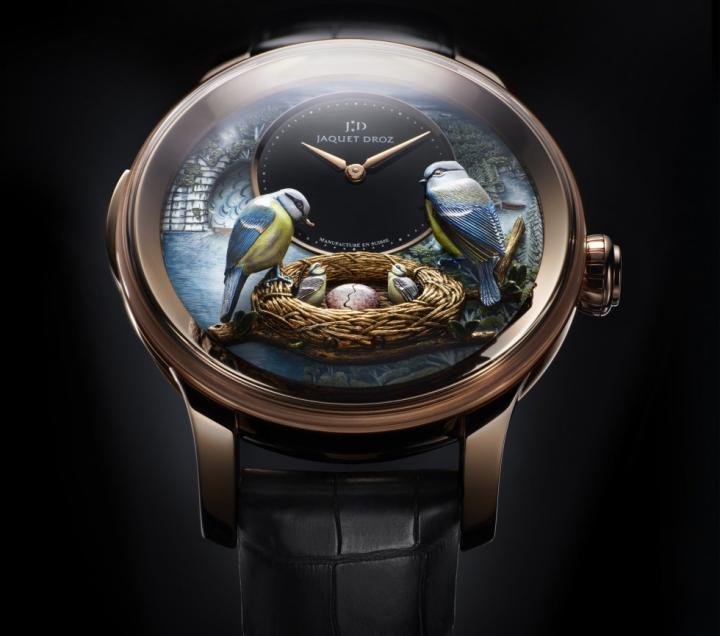 The Bird Repeater was the first wristwatch automaton, introduced by Jaquet Droz in 2012. It represents a pair of blue tits, a symbol of Pierre Jaquet-Droz's native Jura region, over a nest containing their fledglings. No fewer than eight different animation mechanisms act synchronously.