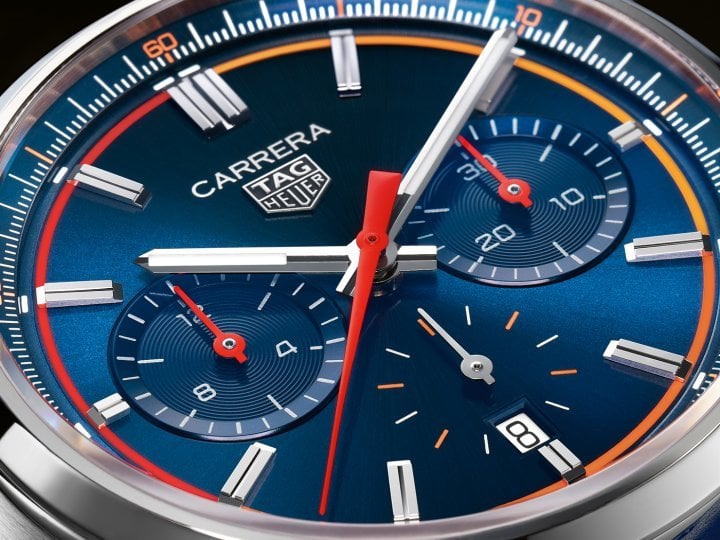 TAG Heuer also introduces the next generation of 42mm Carrera chronographs with a signature blue or black dial and sporty orange gradient detailing reminiscent of classic race car speedometers. 