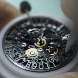 At the heart of the watch, the Automatic Caliber CO 9000