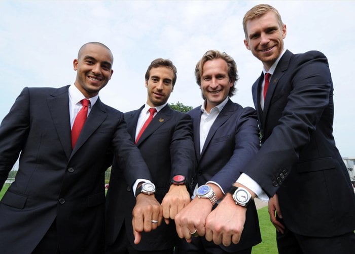 Arsenal players Walcott, Flamini and Mertesacker with Bruno Grande