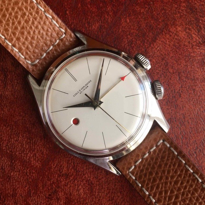 A beautiful alarm watch from the Ecole d'horlogerie de Saint-Imier (powered by a Venus 230)