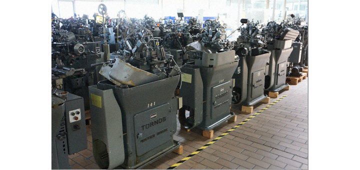 A symbol of past deindustrialisation, this fleet of dozens of Tornos machines has been relegated to the back of a hall in Haut-Doubs.