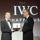 Chinese film director Feng Xiaogang is presented with the IWC Filmmaker Award by IWC Director of Marketing and Communications Goris Verburg