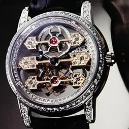 GIRARD-PERREGAUX - Tourbillon sous trois Ponts d'or squelette