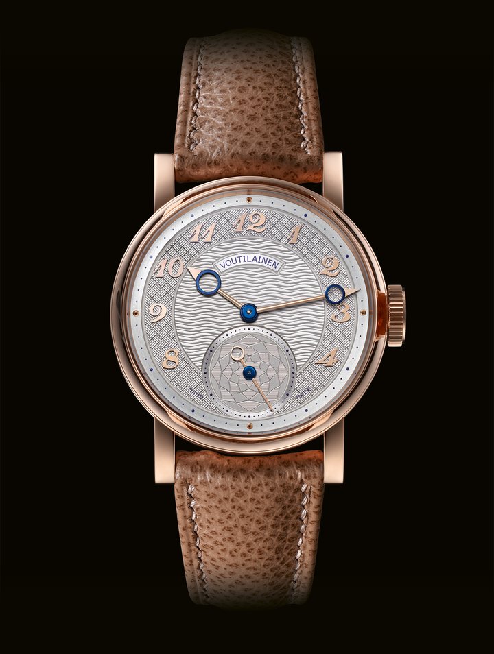 Voutilainen 28 CG, 37mm: the Voutilainen 28 CG is a vibrant tribute to the classical art of hand-guilloché. The guilloché patterns and textures on the white dial, the 37mm case in rose gold or platinum, together with the crown, exude refined elegance. They are the work of Brodbeck Guillochage (whose logo appears on the crown and small seconds), recently inaugurated by Kari Voutilainen (and extensively covered by Europa Star) as a place where this rare craft can thrive. The 28 calibre is designed, built, made, finished and assembled at the Voutilainen workshops. Two escape wheels give direct impulse to the large balance via the impulse roller. This innovative construction provides greater energy efficiency and offers significant benefits of longevity, stability and power reserve.