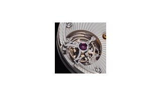 Technotime: double barrels, tourbillons, and balance springs 