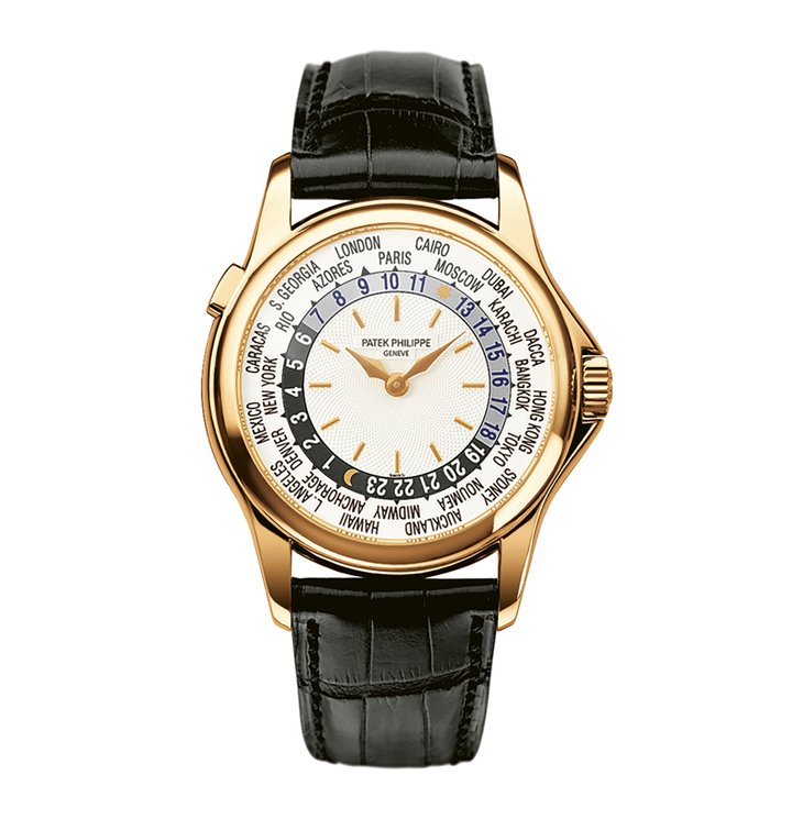 2000 – WORLD TIME REF. 5110 – 37 mm CALIBRE 240 HU: This is the first Patek Philippe World Time watch to feature the highly innovative 240 HU calibre, an automatic micro-rotor movement measuring just 3.8 mm deep. The patented mechanism enables the wearer to simultaneously adjust the city disc and the 24-hour disc with one press of a pusher.