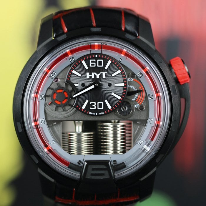 H1 Dracula DLC by HYT in black titanium with retrograde red fluid hours, minutes, seconds, power reserve indicator and regulator functions using a mechanical hand-wound HYT calibre movement.