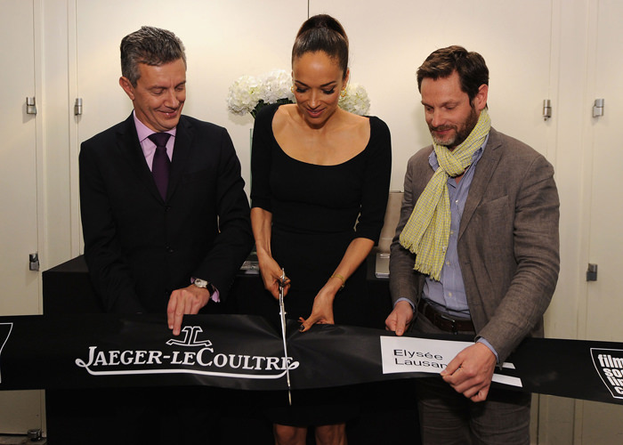 Carmen Chaplin cuts the ribbon at the Musée de l'Elysée with Jaeger-LeCoultre CEO Daniel Riedo and Museum Director Sam Stourdzé