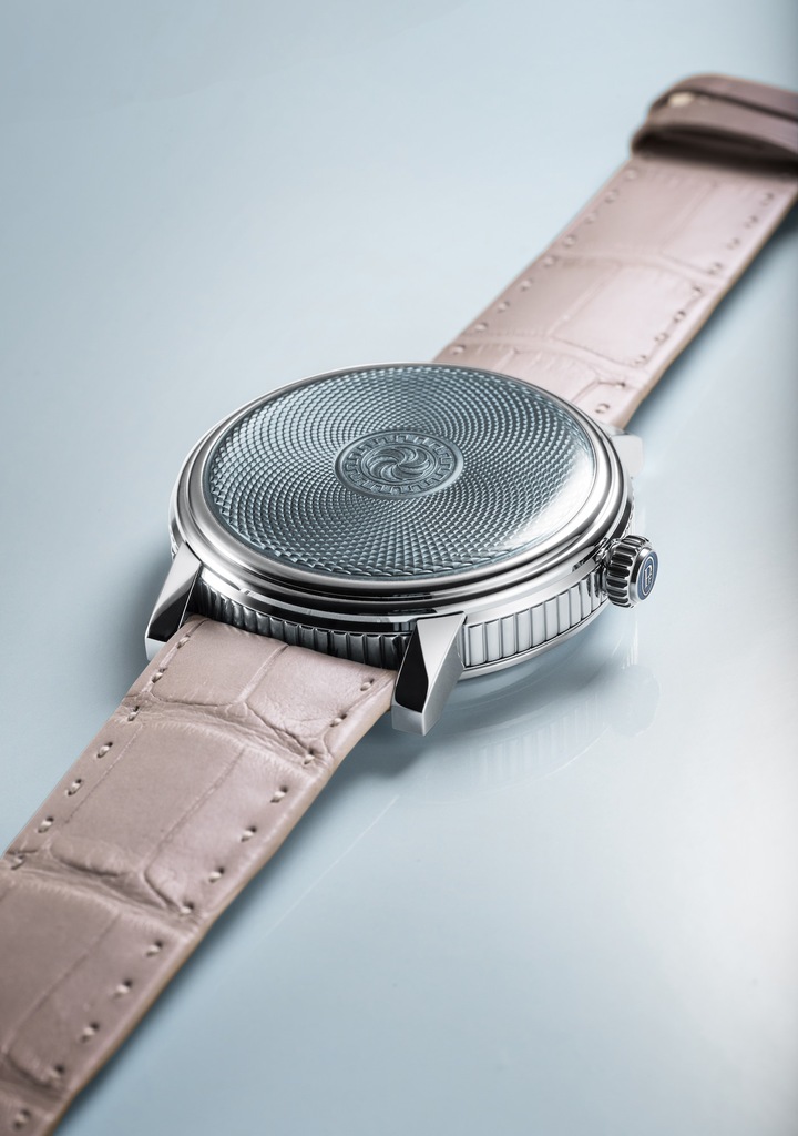 Upturning convention, the L'Armoriale minute repeater reserves its front for a hand-guilloché motif under translucent Grand Feu enamel. The time display is on the reverse, for only the wearer to see, where rose gold hands circle a simple time scale around the periphery of a Guatemalan white jade disc.