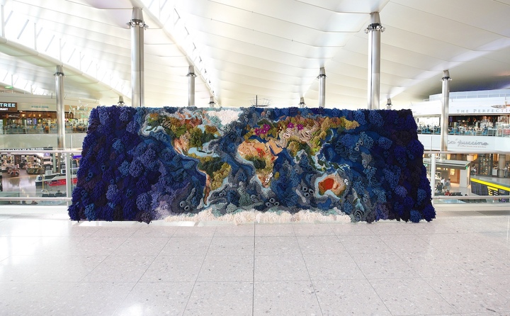 Vanessa Barragão, Botanical Tapestry, 2019. Eight kilograms of jute and cotton and 42 kilograms of recycled wool sourced from waste generated by Portugal's textile industry went into this vast 6 × 2 m world map, with continents and oceans shaped using crochet, latch hook and needle felting. Commissioned to celebrate the partnership between London Heathrow Airport and the Royal Botanic Gardens, Kew, it is installed in Terminal 2.