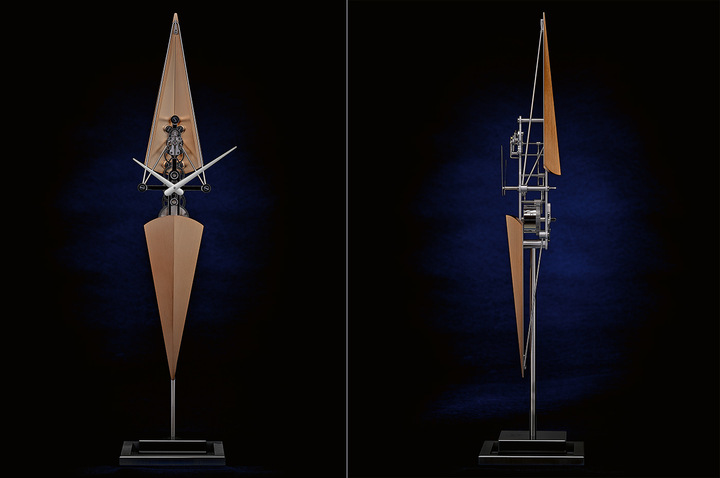 L'Epée – Regatta: L'Épée is renowned as a maker of clocks that measure time in unique, poetic and often humorous ways. The Regatta is a prime example. Its sleek, elongated form appears to hang in space. Inspired by sculls, it captures the grace and power of these water craft. This vertical clock stands 518mm high and provides eight days of power reserve. The vertically aligned rhodium-plated gears are in full view, measuring time with Swiss precision. Offered as six limited editions of 99 pieces each, in champagne, silver, black, red, green or blue. $$$