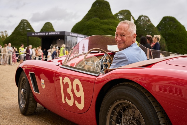 A. Lange & Söhne CEO Wilhelm Schmid at the wheel of a rare historic car at the Concorso d'Eleganza Villa d'Este on the shores of Lake Como. The manufacture has been a partner of the event since 2012.