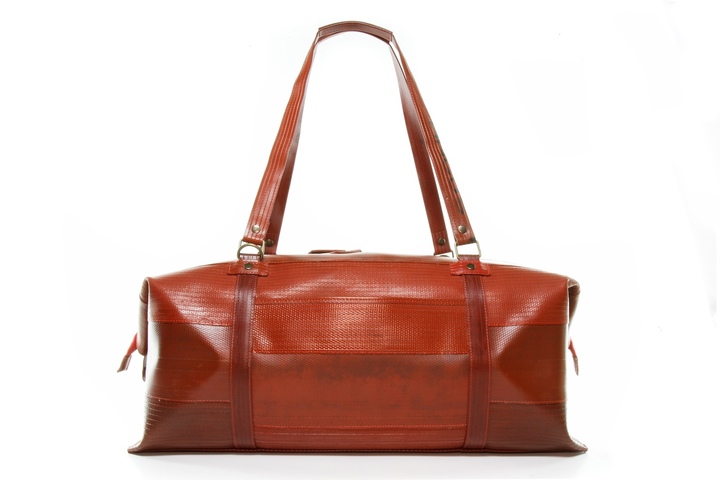The famous Weekend Bag by Elvis & Kresse, made from reclaimed London Fire Brigade hoses.