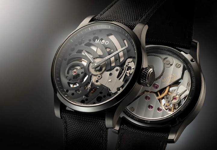 The dial-less Multifort Mechanical Skeleton Limited Edition, with a 44 mm diameter black PVD-treated titanium case, displays its skeleton movement (a first for Mido) with its hands integrated directly into the black plate decorated with Côtes de Genève. Limited series of 999 numbered pieces.