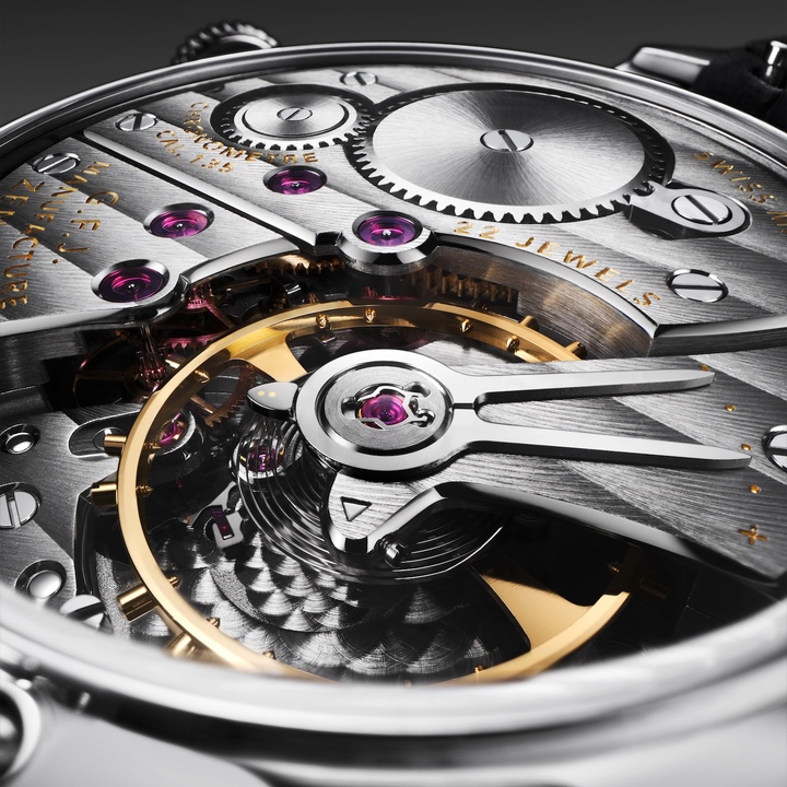 Through the sapphire caseback, the G.F.J.'s Calibre 135 reveals Geneva stripes, hand-bevelled bridges and a dark ruthenium finish.