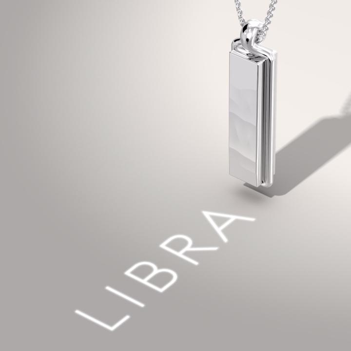 A white gold pendant made in collaboration with the Sang Bleu studio