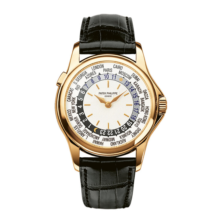 2000 – WORLD TIME REF. 5110 – 37 mm CALIBRE 240 HU: This is the first Patek Philippe World Time watch to feature the highly innovative 240 HU calibre, an automatic micro-rotor movement measuring just 3.8 mm deep. The patented mechanism enables the wearer to simultaneously adjust the city disc and the 24-hour disc with one press of a pusher.
