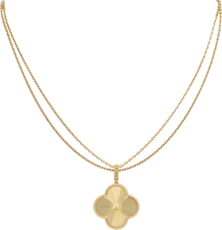 Magic Alhambra long necklace in guilloché yellow gold. In 1968, Van Cleef & Arpels created the first Alhambra long necklace, inspired by the four-leaf clover shape. This motif has since become the absolute emblem of the Richemont-owned brand.