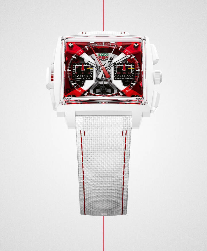 A vibrant, red-tinted translucent dial captures the sheer adrenaline of race day. The chronograph counters are inspired by racetrack design, featuring an asphalt-like finish, white and yellow starting grid positions and the official F1 typography. The counters also feature the phrase made famous by British commentator David Croft: “LIGHTS OUT & AWAY WE GO.” This legendary declaration captures the electric anticipation of every Grand Prix start. 
