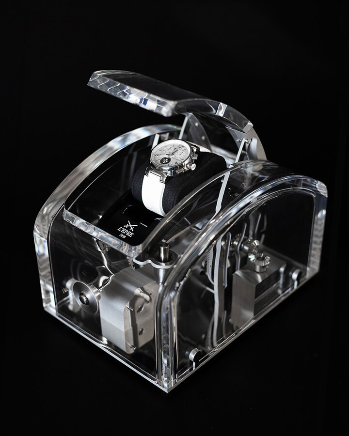 Designed in collaboration with Winston Chapman, the Watch Box springs to life at the press of a button, when a mechanical system opens the box at the same time as it lifts the wristwatch.