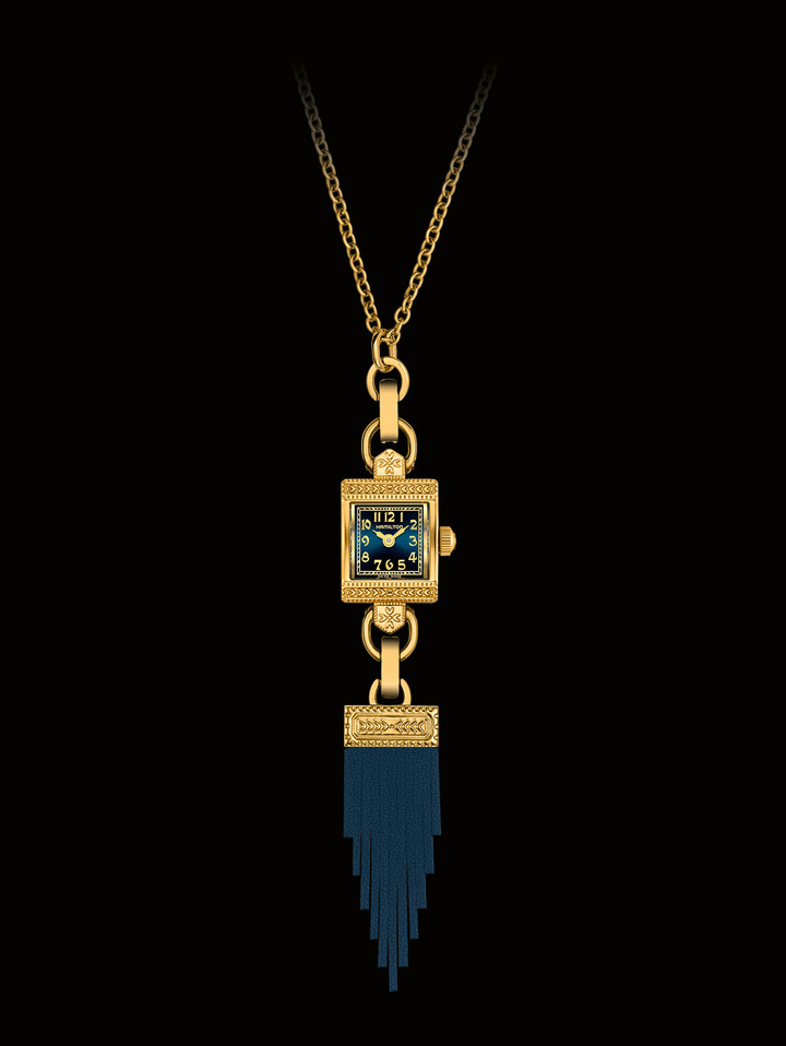 Hamilton – American Classic Lady Hamilton Necklace: Wearing a watch as a necklace is a tradition that Hamilton revives with the Lady Hamilton Necklace. The epitome of 1930s Art Deco style, it can be worn as part of a necklace or as a timepiece paired with a delicate chain bracelet. Three versions are available: stainless steel, yellow gold or rose gold PVD. Each Lady Hamilton Necklace comes with an adjustable chain and a fringed tassel pendant in forest green, midnight blue, or red burgundy. $