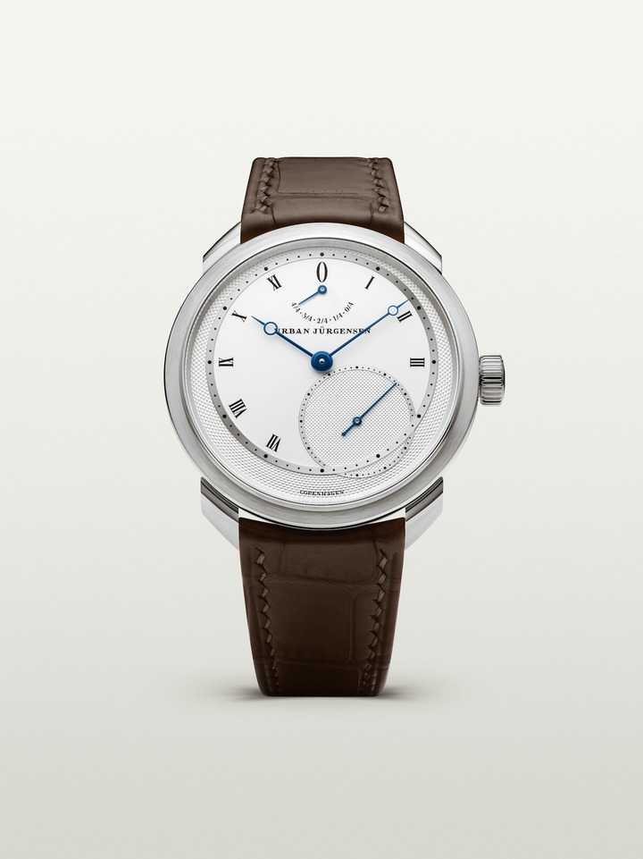 The UJ-2 in its platinum case with a light silver dial.